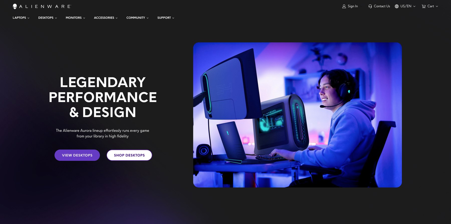 Concept for the Alienware.com homepage: a Legendary Performance & Design headline with View Desktops and Shop Desktops buttons beside a photo of a smiling gamer in a headset at an Alienware desktop setup lit in purple.